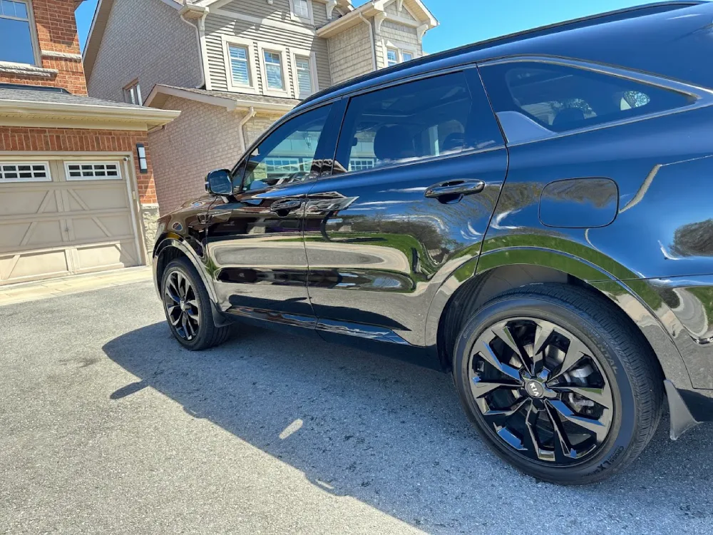 Black SUV exterior finish after detailing service